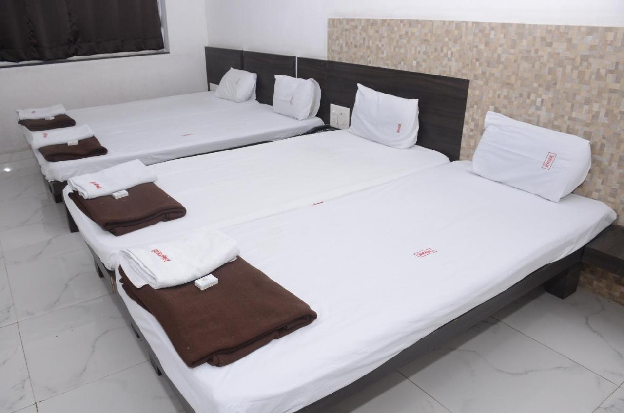 Hotel Mangalam Kurandvad Extérieur photo