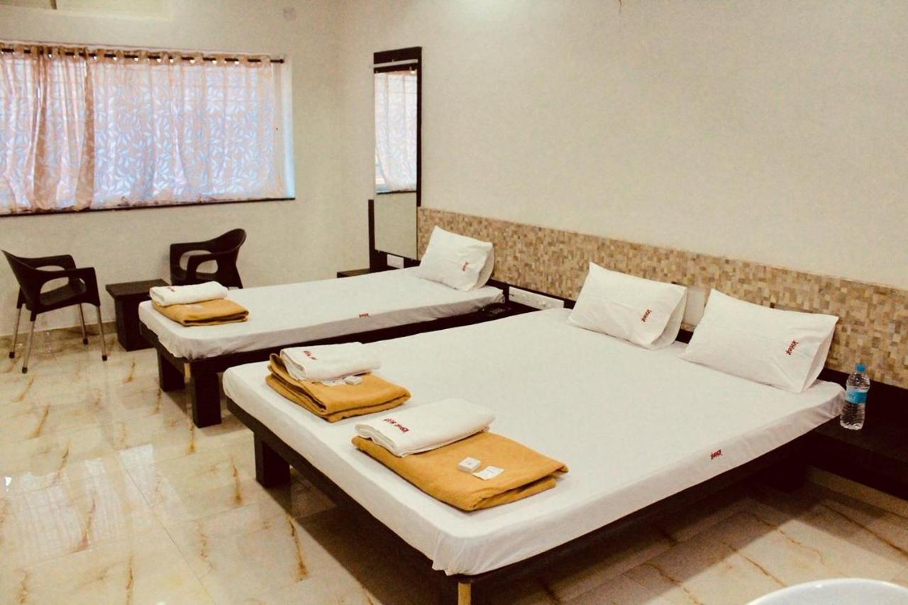 Hotel Mangalam Kurandvad Extérieur photo